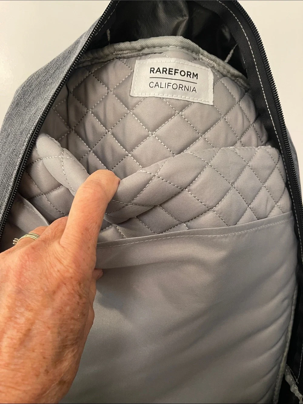 RAREFORM California Men's Black Backpack with Red and Blue Speckle Pattern